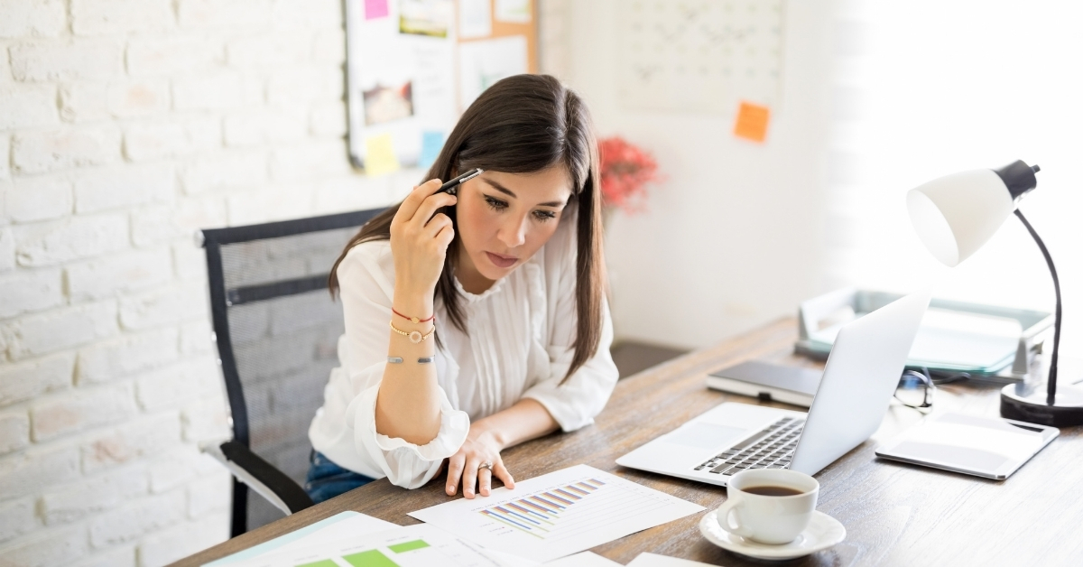 Woman reviewing report
