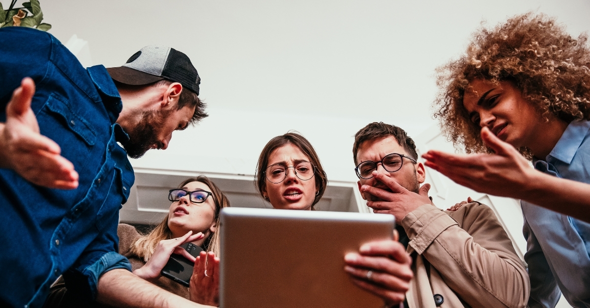 team confused and debating what they're looking at on an ipad