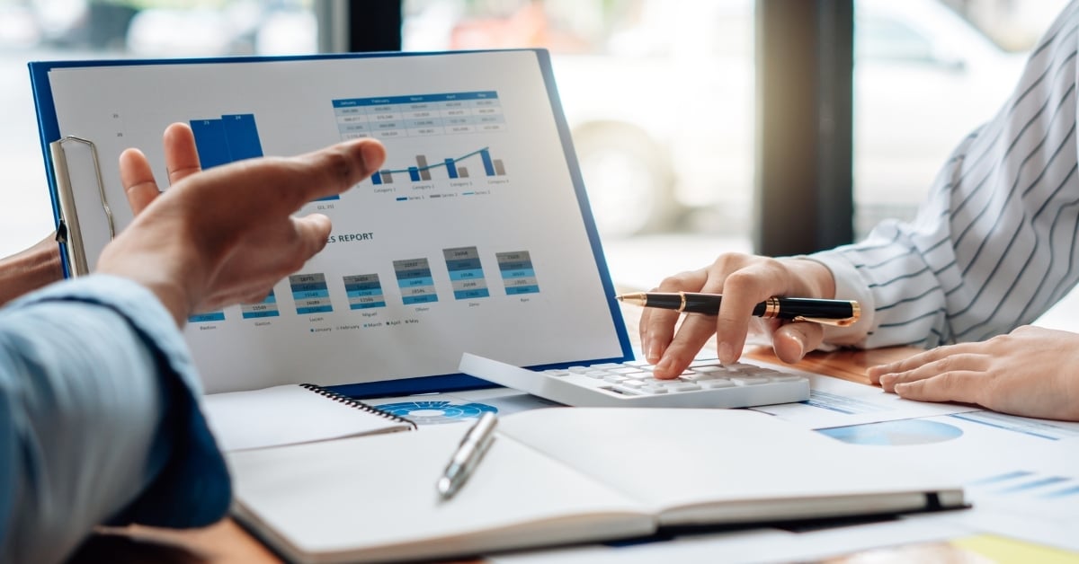 two people questioning data in a chart